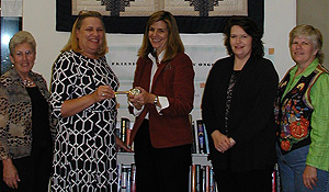 Doris Surratt, library assistant;  Pat Gwyn, branch librarian;  Dr. Michele Gillespie;  Cristi Stevens, president of the Friends of the Mount Airy Public Library; and Dawn Walker, member of the Friends of the Library.
