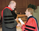 Peter H. Brubaker, right, receives award from Graduate School Dean Gordon A. Melson