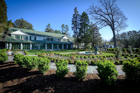 Photograph of Reynolda House Museum of American Art with early March garden in bloom