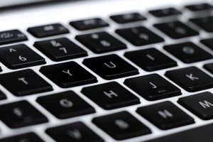 Close-up photograph of keys on a laptop keyboard