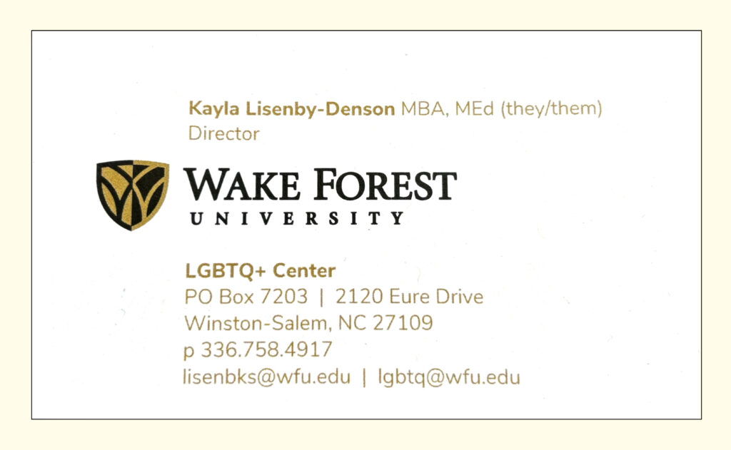 A business card with pronouns included