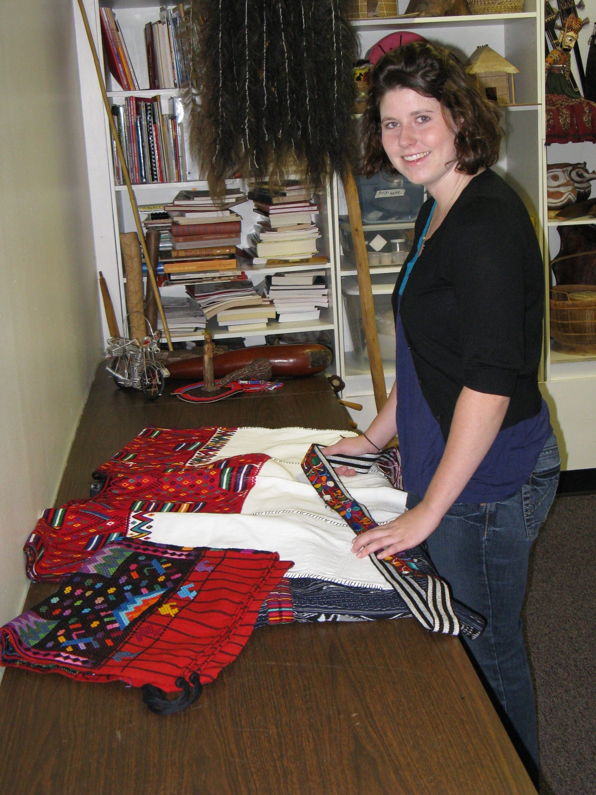 Student curator Lydia Dorsey researches clothing for the exhibit.