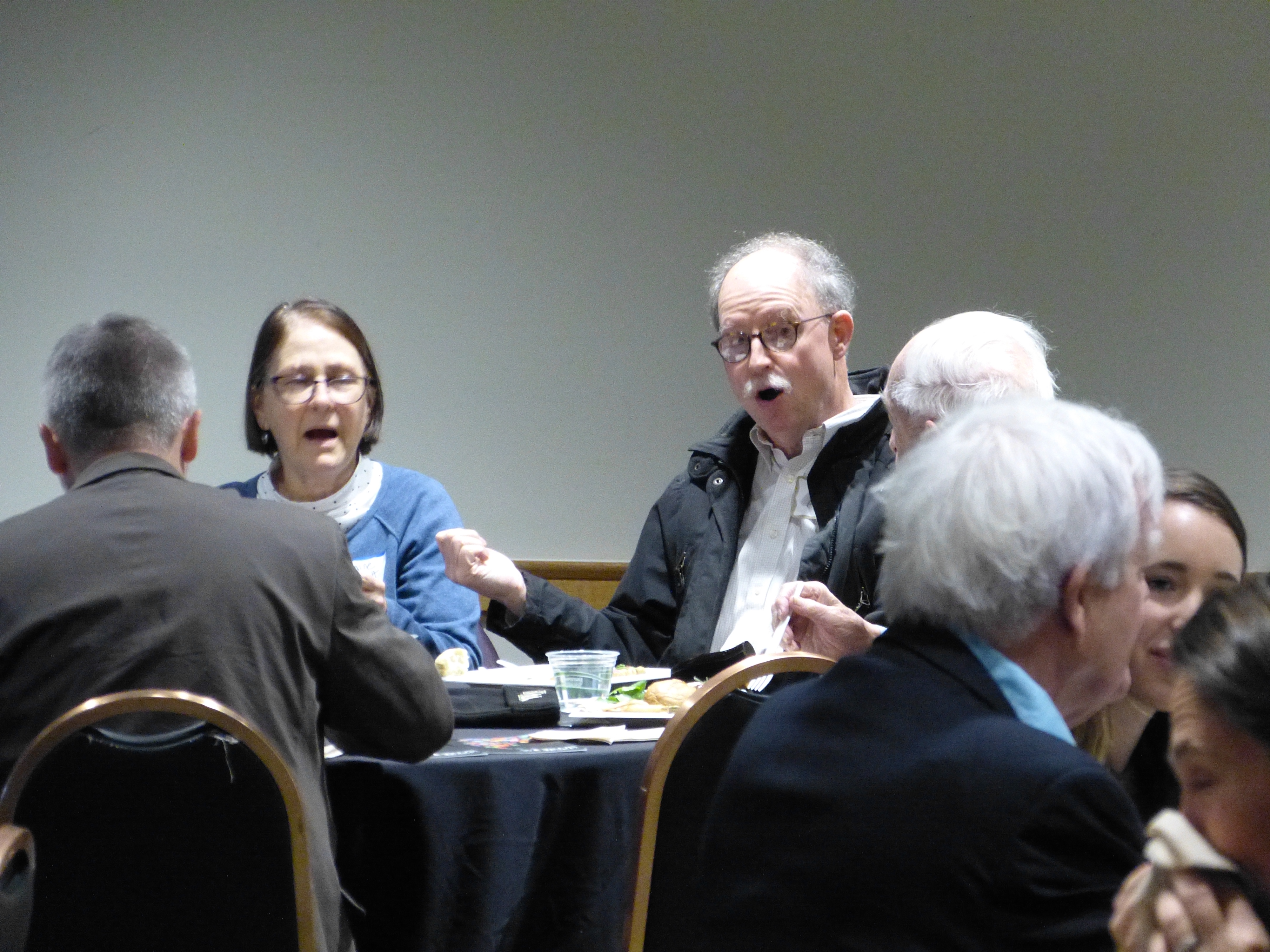 Dr. Phillips enjoying lunch conversations at Words Awake