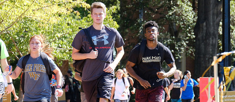 Students run together during Hit the Bricks at WFU.